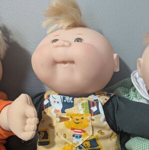 12" Cabbage Patch doll WITH EXTRA CLOTHES and 3 Pairs of shoes FOR FREE